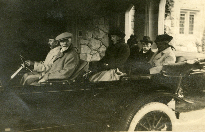 Archival photo of people in car at Hatley