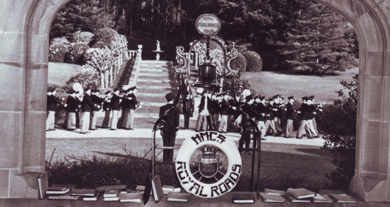 Archival black and white photo of military in formation