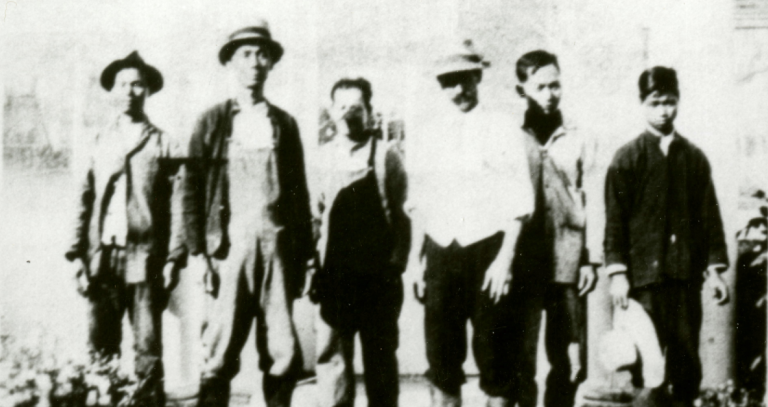 Archival photo of group of people outside