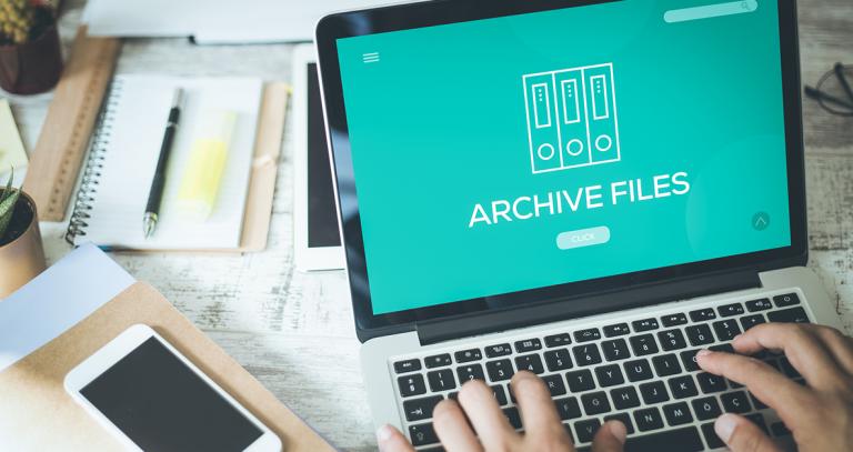 Laptop screen showing the words "archive files"