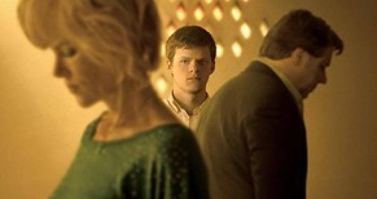 cover art for Boy Erased: a young man (centre) looks at the camera while an older man and woman frame him, facing away and looking down